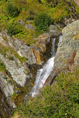 Scenic close-up view of Foss River at Swiss mountain pass Gotthard on a sunny late summer day. Photo taken September 10th, 2023, Gotthard, Switzerland.
