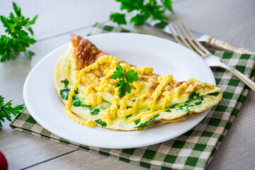 fried omelette stuffed with herbs, parsley, dill