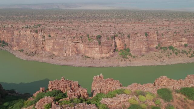 penna river going in between canyon at gandikota, kadapa, andhra pradesh , india, push in drone shot
