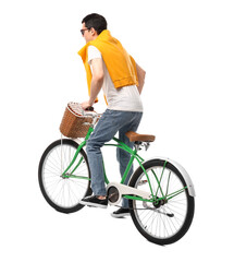Man in sunglasses riding bicycle with basket on white background