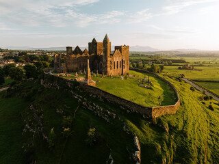 Aerial view of the Rock of Cashel, a historic landmark in County Tipperary, Ireland. © Wirestock