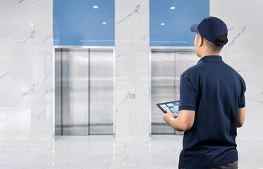 Technician or engineer check on elevator or passenger lift