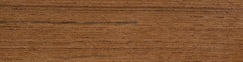 Teak veneer with smooth grain and warm cinnamon wood tones