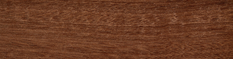 Fototapeta premium Mahogany veneer surface with a smooth finish and warm, deep brown tones