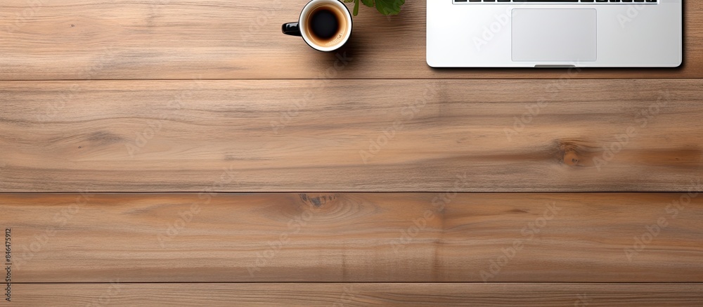 Aufkleber The office table is seen from above displaying a laptop a notepad and a cup of coffee There is enough free space for additional images or text