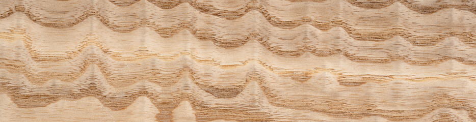 Elegant Tamo veneer showcasing unique wavy grain patterns