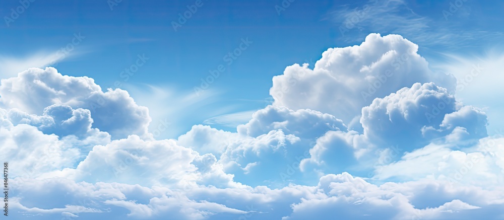 Poster the image features a captivating abstract background of blue sky and clouds providing ample space fo