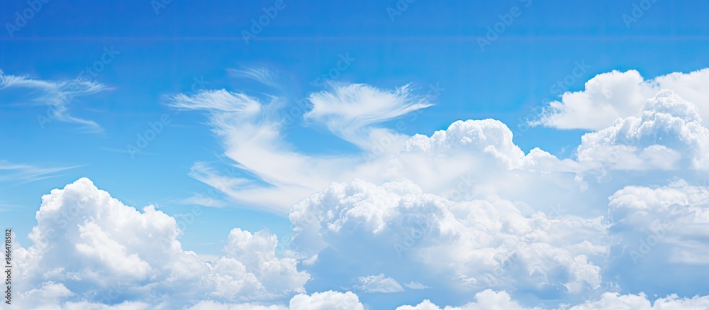 Poster the image features a captivating abstract background of blue sky and clouds providing ample space fo
