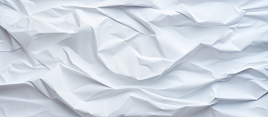 Obraz premium The white crumpled paper creates an interesting and textured background perfect for a copy space image