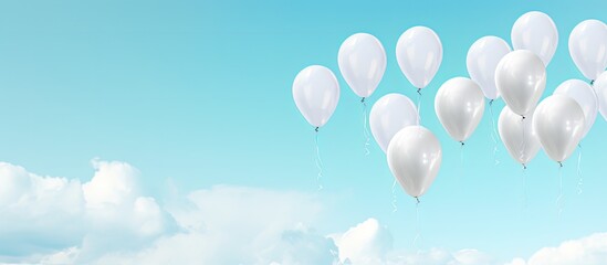 Fototapeta premium There s a celebration moment with a beautiful view of white helium balloons floating in the sky providing ample copy space for text