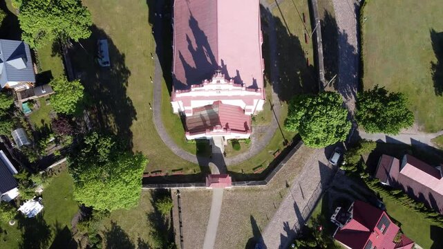 Merkine, Lithuania, from an aerial perspective, with the Church of Saint Mary of the Assumption