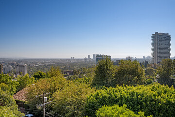 Fototapeta premium Aerial view of a hilltop building with tree surroundings
