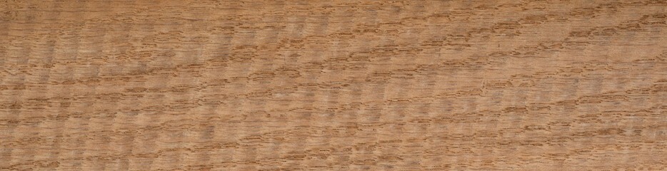 Subtle diagonal wave pattern on a European oak wood veneer surface