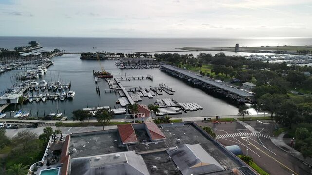 urban buildings by the Parrot Cove Marina with moored boats in Bradenton, FL, United States