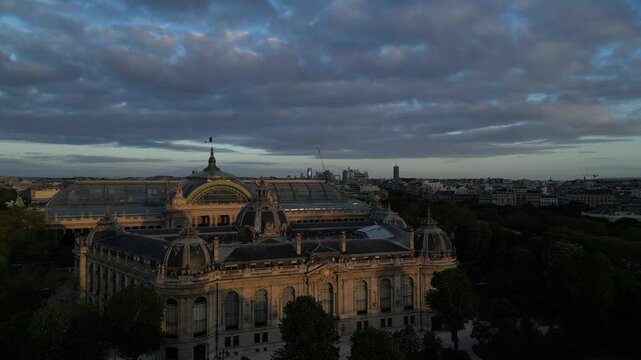 Drone shot of the Petit Palais and the Grand Palais des Champs-Elysees at sunrise in Paris, France