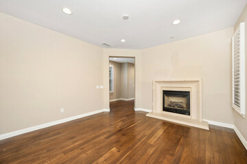 Fototapeta premium Spacious room with hardwood floors and a fireplace. California, USA