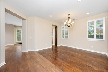 Living room with wooden floors and an elegant chandelier. California, USA