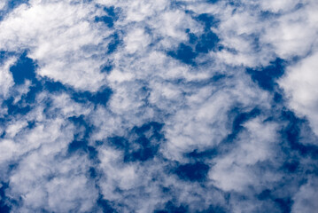 Obraz premium pattern blue day sky with white clouds