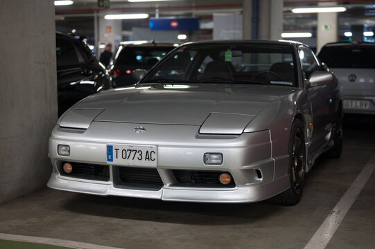 Beautiful and classic gray Nissan Silvia S13 that goes unnoticed parked in a parking lot