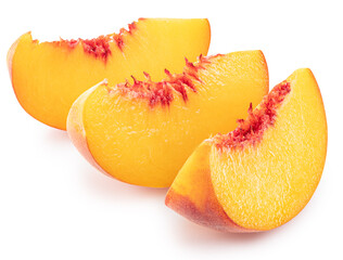 Ripe peach slices on white background. File contains clipping path.