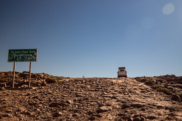 4x4 vehicle driving up a dirt road © Philip