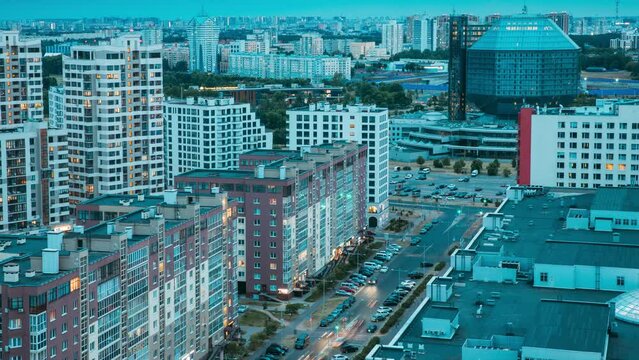 Minsk, Belarus. National Library Building In Evening Night. Famous City Hi-tech Modern Landmark. Time-lapse Evening Lighting Scenic View Of Library