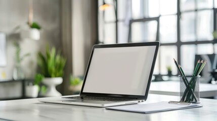 a workplace with a laptop at home or in the office
