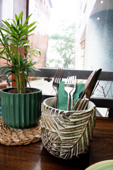 The interior of a cozy outdoor terrace in the restaurant.