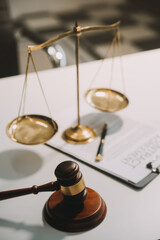 Lawyer, legal advisor, businessman brainstorming information on agreement details Business contracts in legal processing books for accuracy in contract documents. joint financial investment.