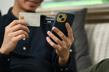 Man making financial transaction and entering username and password for safety internet security access