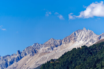 Scenic view of mountain Valley Bedretto in the Swiss Alps with mountain peak on a sunny late summer day. Photo taken September 10th, 2023, Gotthard, Canton Ticino, Switzerland.