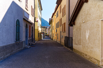 Scenic view of alley at Swiss mountain village Airolo on a sunny late summer noon. Photo taken September 10th, 2023, Airolo, Canton Ticino, Switzerland.