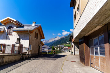 Scenic view of alley at Swiss mountain village Airolo on a sunny late summer noon. Photo taken September 10th, 2023, Airolo, Canton Ticino, Switzerland.