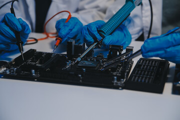 Close up of Technician measuring voltage electronic circuit board television, Service after sale fix electric equipment within insurance.