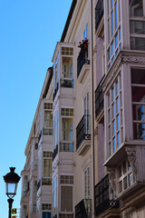 Typical galeria glass balconies in north of Spain - city street