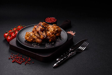 Delicious crispy grilled wings with teriyaki sauce with salt, spices