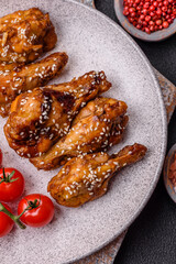 Delicious crispy grilled wings with teriyaki sauce with salt, spices