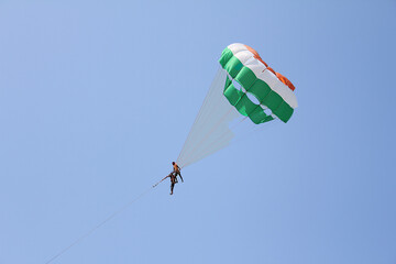 paragliding in the blue sky