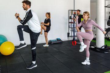Group workout session in a modern gym setting