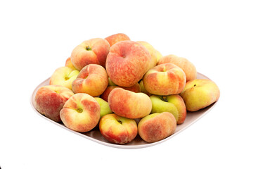 Flat peach or donut peach (Prunus persica var. platycarpa) is a variety of peach with pale yellow fruit hat is oblate in shape.
