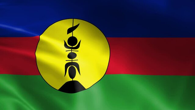 New Caledonia flag in the wind. Detailed fabric texture.