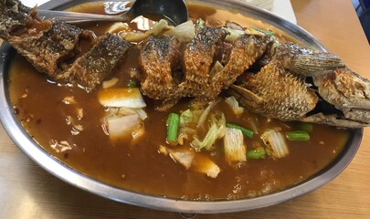Fried Fish in Thai Sour Soup with Mixed vegetable