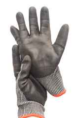 Hand wearing a black work glove holds another glove on a background. Working hand.