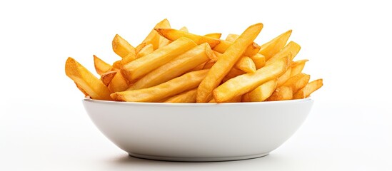 A bowl of crispy french fries with a white background for copy space image.