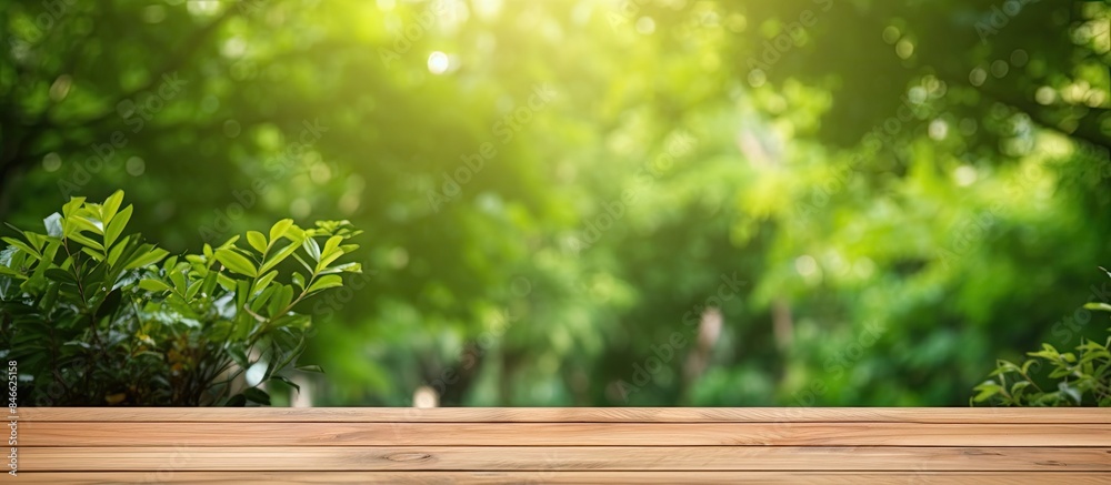 Poster wooden table set in outdoor garden with blurred green trees providing a natural backdrop, creating a