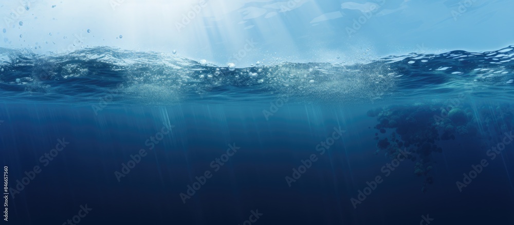 Poster exploring the ocean depths with a serene blue backdrop, perfect for a copy space image.