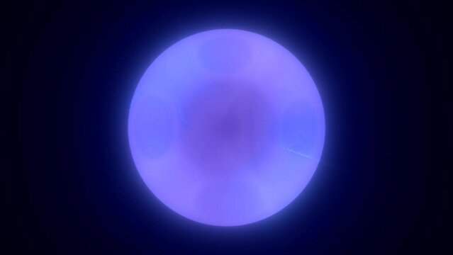 Abstract blue bright glowing background with a sphere core atom energy burning ball circle made of waves of energy rays and plasma with light video in high quality 4k, motion design