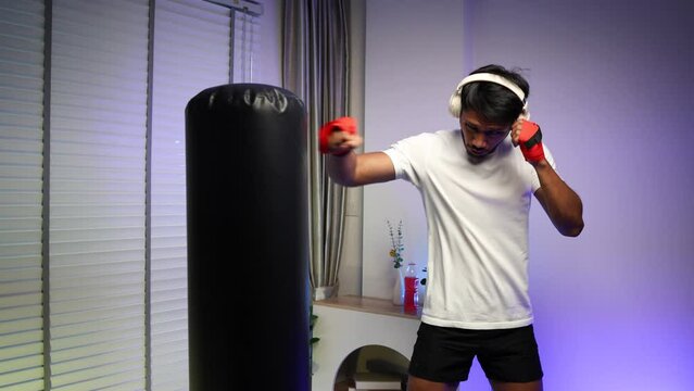 he is practicing boxing in his private gym, exercise is good for heath that is why he likes to do boxing, training in the gym to make his body strength and that is his motivation