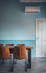  simple modern conference room with brown leather chairs and a wood table