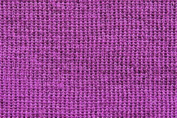 Purple knitted fabric texture as background